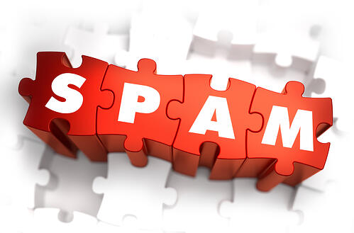 Spam - Text on Red Puzzles with White Background. 3D Render.
