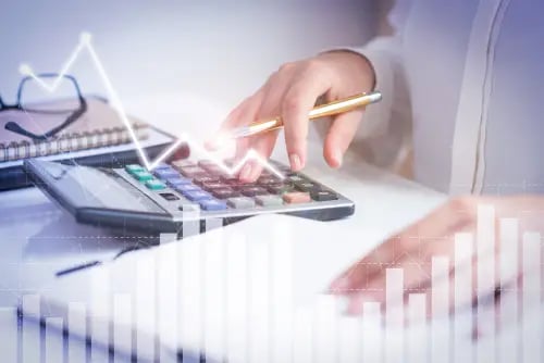 accountant-calculating-profit-with-financial-analysis-graphs