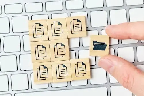 concept-document-management-system-dms-person-archives-files-folder-hand-cubes-keyboard