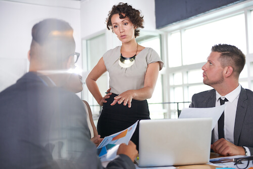 team of successful business people having a meeting in executive sunlit office-3