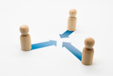 wooden-human-arrow-with-joint-venture-arrow-concept-team-work-partnership-cooperation
